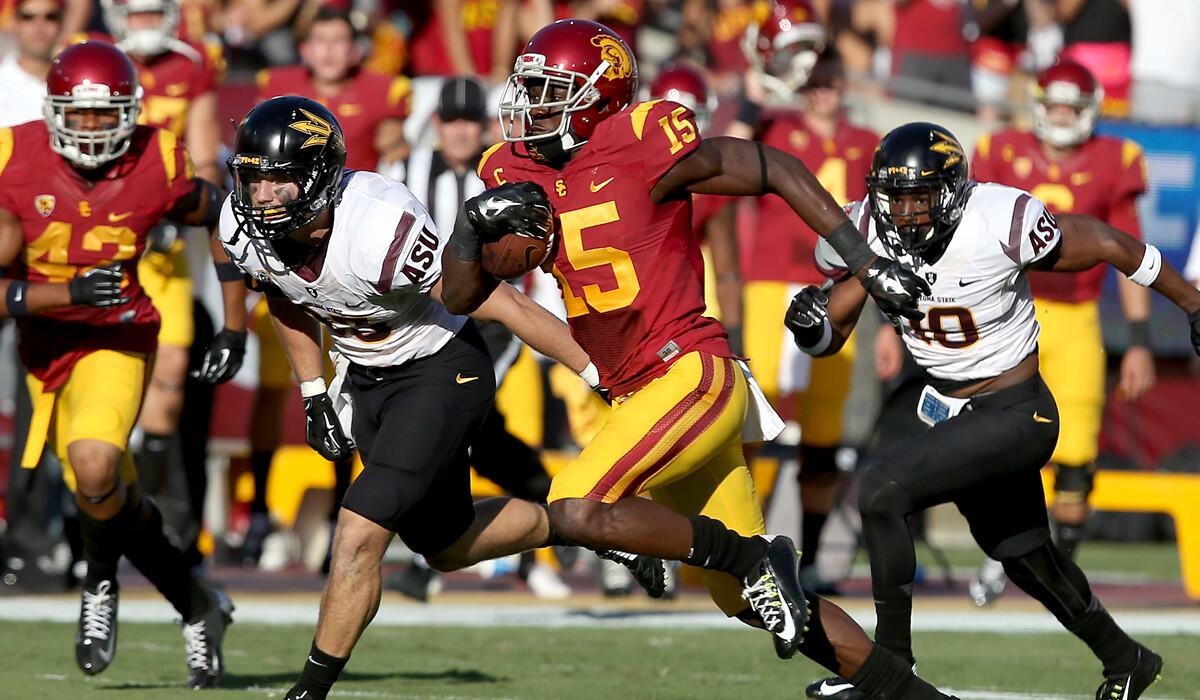 USC receiver Nelson Agholor returns a punt for a touchdown against Arizona State last season.