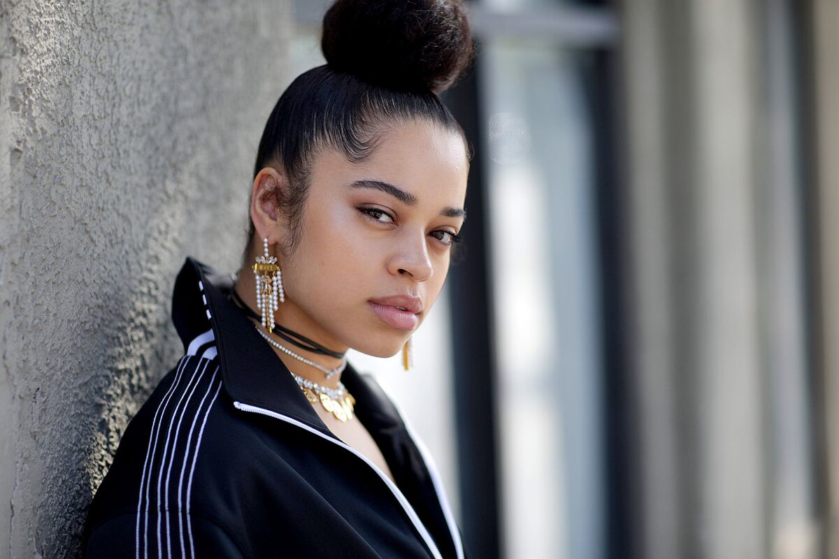 Ella Mai says she's glad her song "Boo'd Up" took more than a year to catch on in radio.