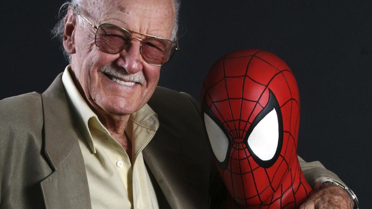 Stan Lee with an old friend in 2011.