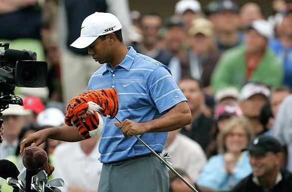 Tiger Woods prepares to tee off on the first day of the U.S. Open at Torrey Pines Golf Course, where he'd defeat Rocco Mediate in a playoff to win the 2008 title despite a badly injured knee. Woods would take the rest of the year off to have surgery and recover. He won six times in eight starts worldwide.