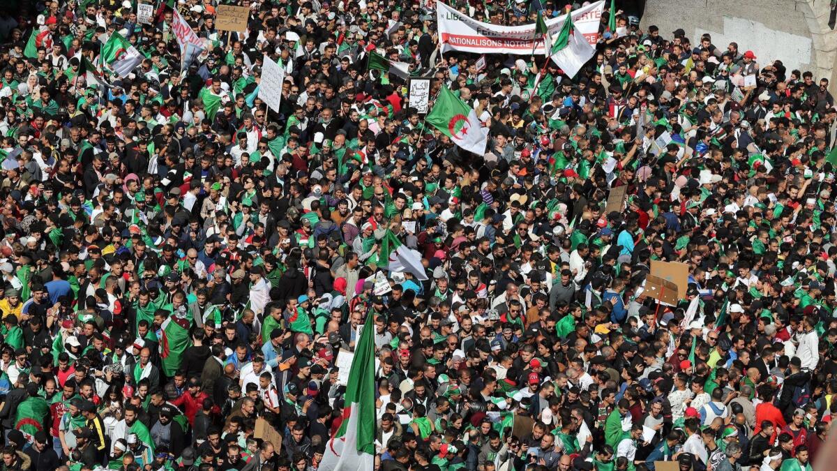 Algerians protest President Abdelaziz Bouteflika in Algeria. Protests continued in Algeria despite the president's announcement on March 11 that he will not run for a fifth term.