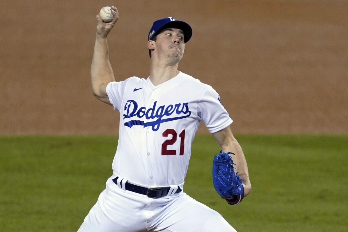 Los Angeles Dodgers starting pitcher Walker Buehler throws to a Milwaukee Brewers batter.