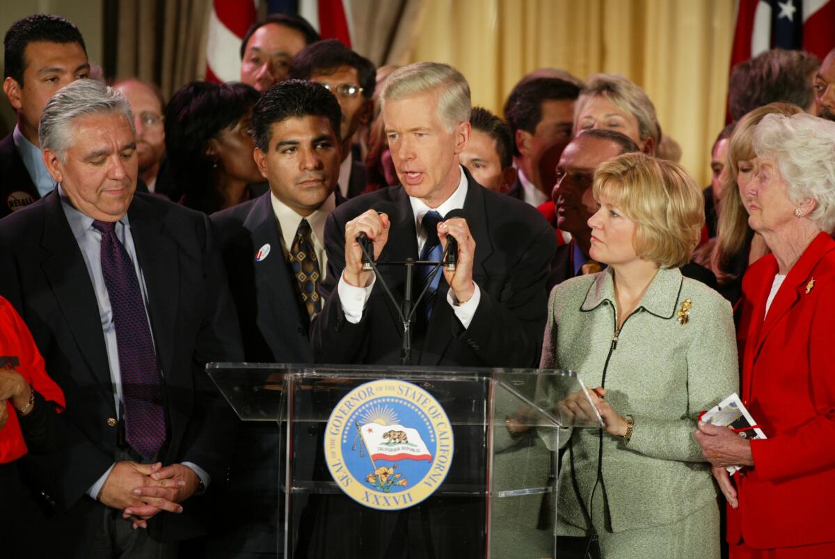 Then Gov. Gray Davis at lectern with crowd of supporters