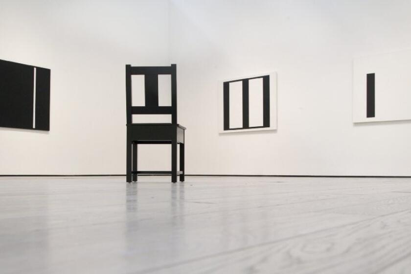 Abstract paintings by John McLaughlin (1898-1976) are echoed in a chair design by Roy McMakin.