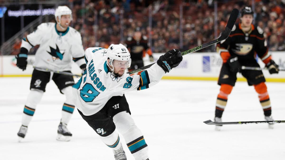 Sharks' Melker Karlsson follows through on a scoring shot during the third period against the Ducks on Sunday.