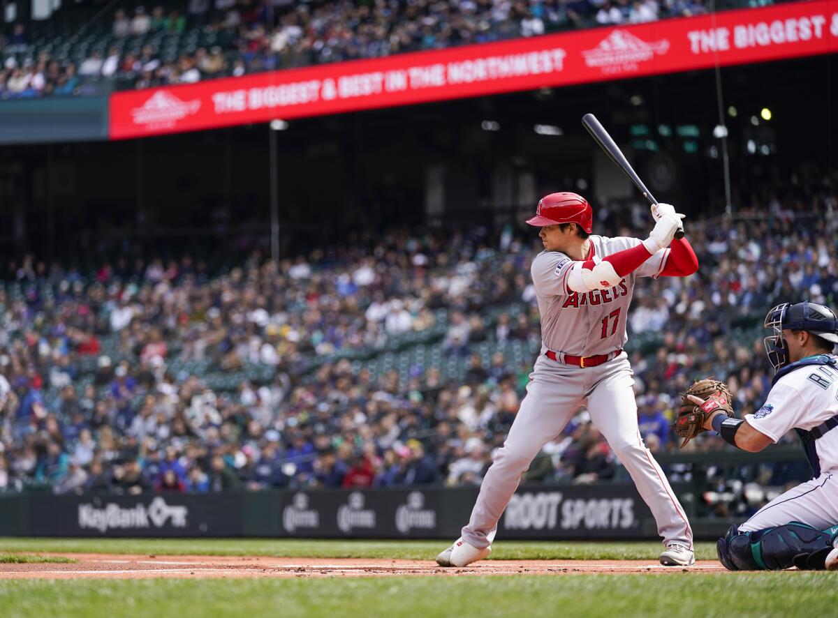 Angels' Shohei Ohtani bats during the first inning against the Seattle Mariners.