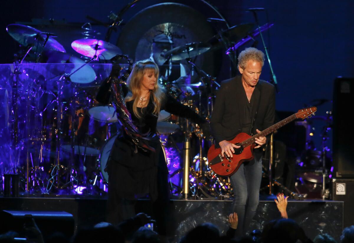 Stevie Nicks, left, and Lindsey Buckingham performing with Fleetwood Mac in 2014.