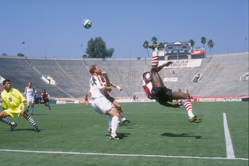 22 Sep 1996: Forward Dante Washington of the Dallas Burn is caught in mid jump as he attempts a bicycle kick during a run on goal in the Burn's 2-1 Major League Soccer MLS loss to the Los Angeles Galaxy at the Rose Bowl in Pasadena, California. Mandat