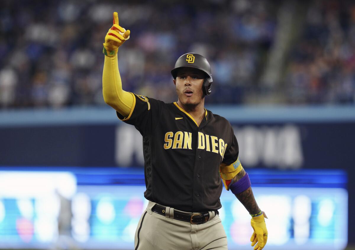 Machado drives in 2, Darvish pitches 6 innings for win as Padres