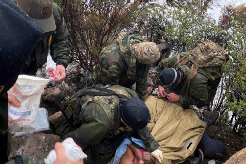 Agents from Border Patrol Search, Trauma and Rescue (BORSTAR) work Feb. 10, 2020 to try to save the life of Juana Santos Arce