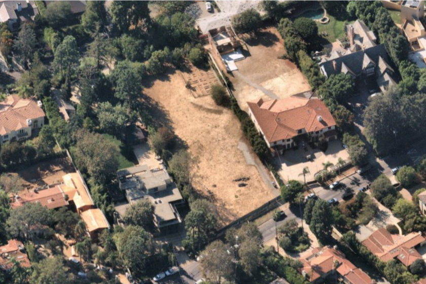 The empty lot covers nearly an acre in an affluent area of Brentwood.