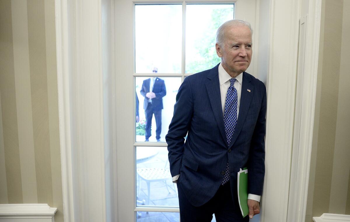 Vice President Joe Biden attends a bilateral meeting in the Oval Office between President Obama and King Salman of Saudi Arabia on Sept. 4, 2015.