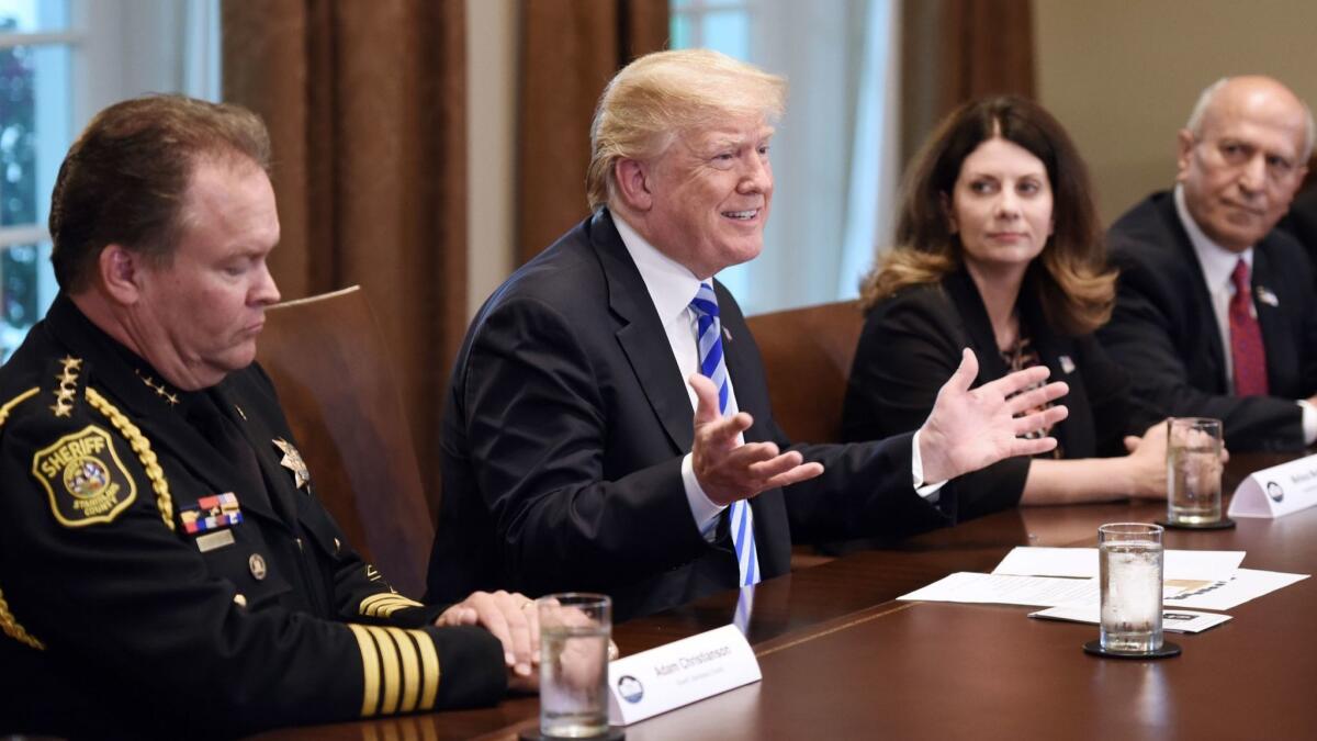 President Trump hosts a roundtable on California's "sanctuary" law with some of the state's Republican officials and law enforcement on Wednesday. The law is already a key part of GOP campaigns in the state.