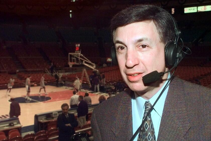 FILE - Marv Albert poses at Madison Square Garden in New York, in this Sunday, Feb. 7, 1999, file photo