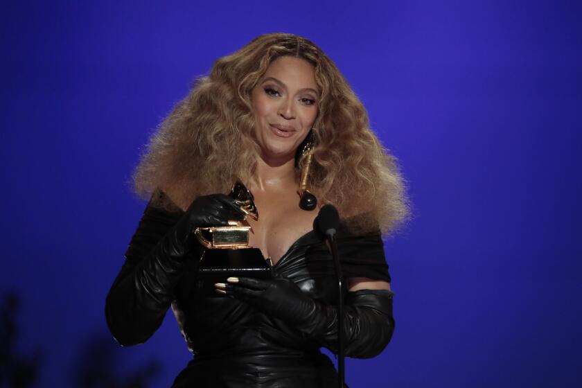 Los Angeles, CA, Sunday, March 14, 2021 - Beyonce makes History with the Best E&B Performance winning 28 Grammys, more that any female or male performer, accepts the award for Best R&B Performance at the 63rd Grammy Award outside Staples Center. (Robert Gauthier/Los Angeles Times)