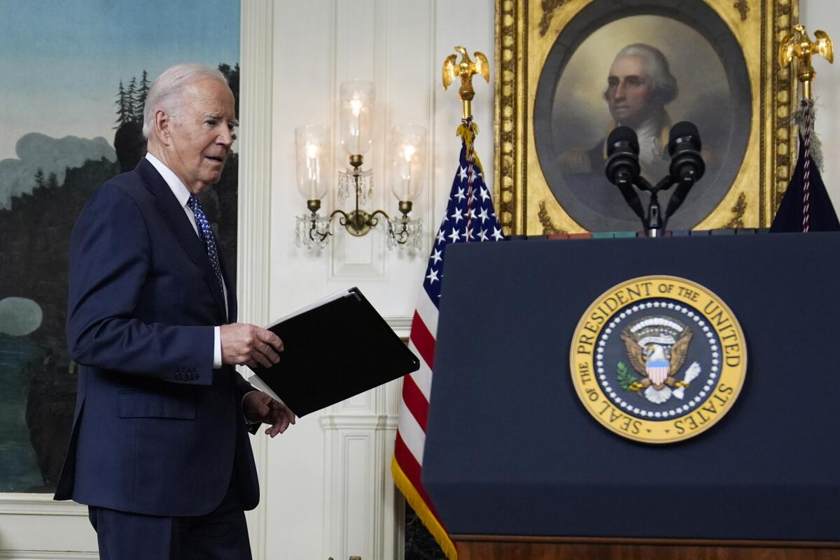 President Joe Biden arrives to speak in the Diplomatic Reception 