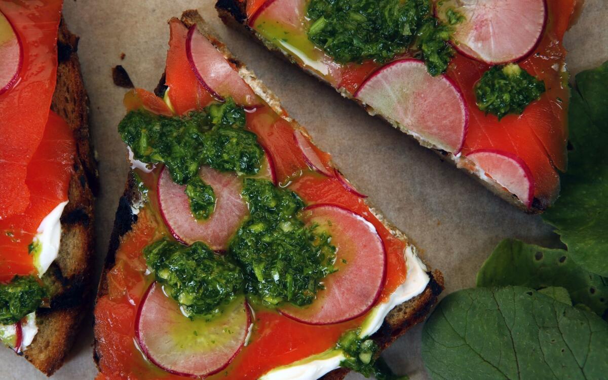 Radish, salmon and radish green salsa verde toasts.