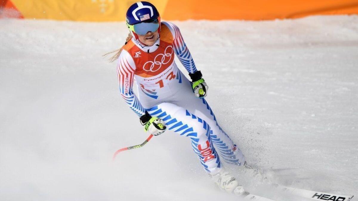 Lindsey Vonn reacts after crossing the finish line during the women's downhill at the 2018 Winter Olympic Games.