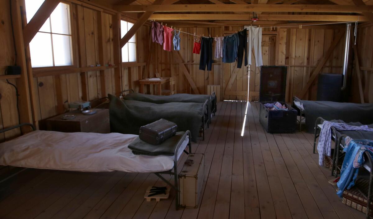 An exhibit of articles inside a replica barracks at Manzanar National Historic Site.