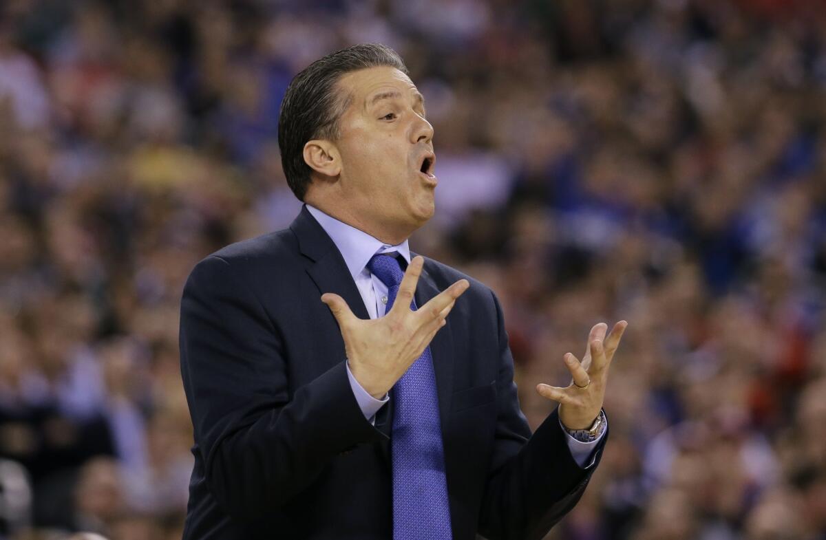 Kentucky head coach John Calipari, early in the game Saturday in which his Wildcats were knocked out of the NCAA championship by Wisconsin.