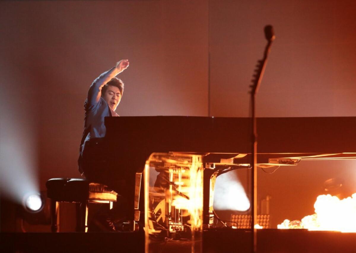 Lang Lang performing at the 2014 Grammy Awards at Staples Center in L.A. He'll kick off the Philharmonic Society of Orange County's 2015-16 season with a recital at Segerstrom Concert Hall in Cost Mesa.