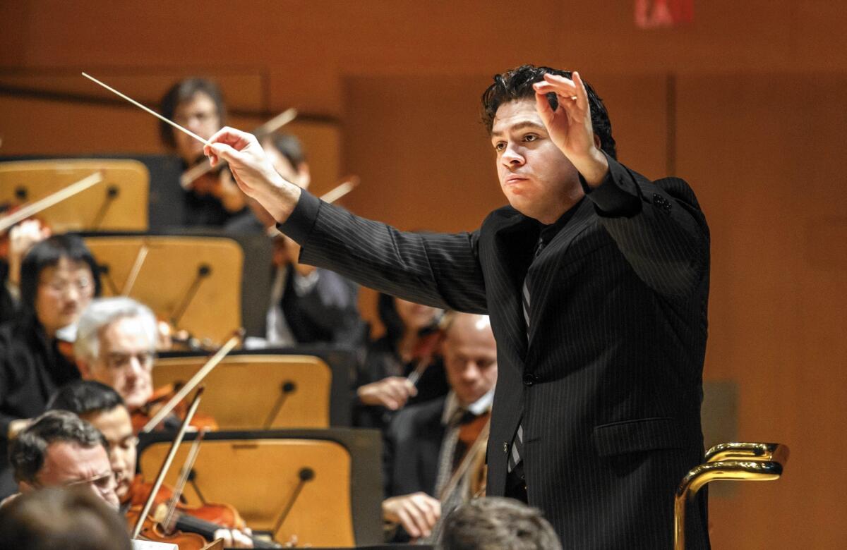Conductor Cristian Macelaru with the Los Angeles Philharmonic at the Disney Concert Hall on Dec. 18, 2015.