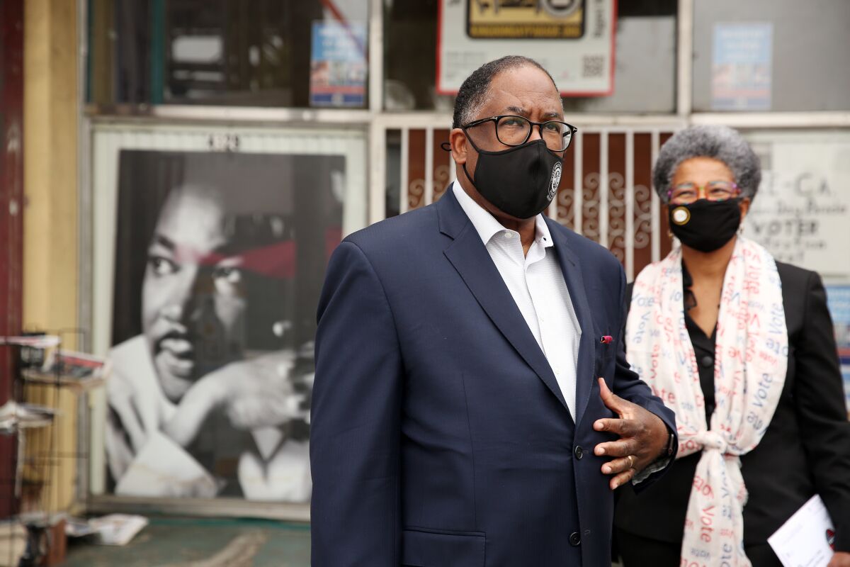 L.A. County Supervisor Mark Ridley-Thomas prior to casting his vote with wife, Avis Ridley-Thomas.