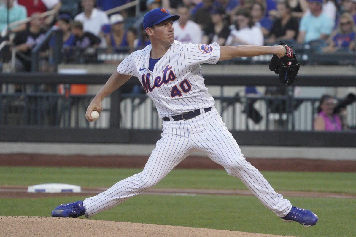 New York Mets' Chris Bassitt pitches during the first inning of a baseball game against the Cincinnati Reds, Monday, Aug. 8, 2022, in New York. (AP Photo/Bebeto Matthews)