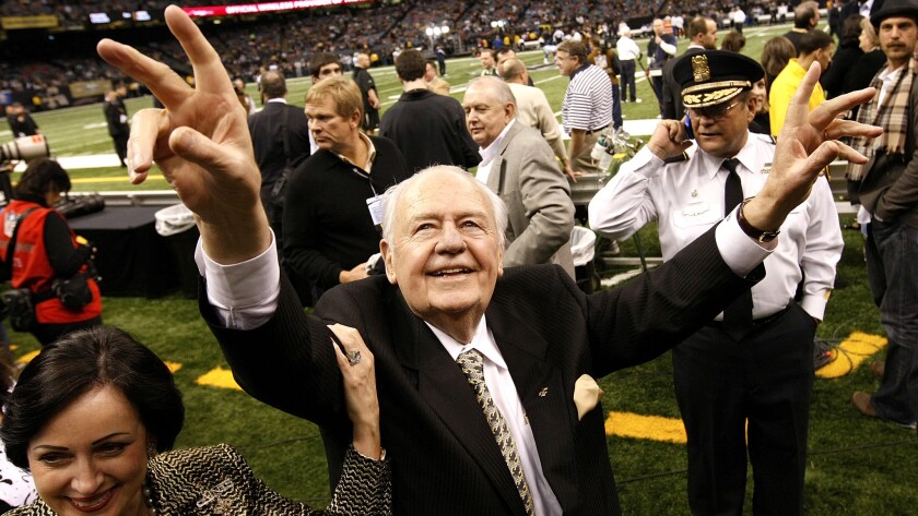 Tom Benson celebrates after the New Orleans Saints defeated the Dallas Cowboys during the 2009 season, when they ended up winning the Super Bowl.
