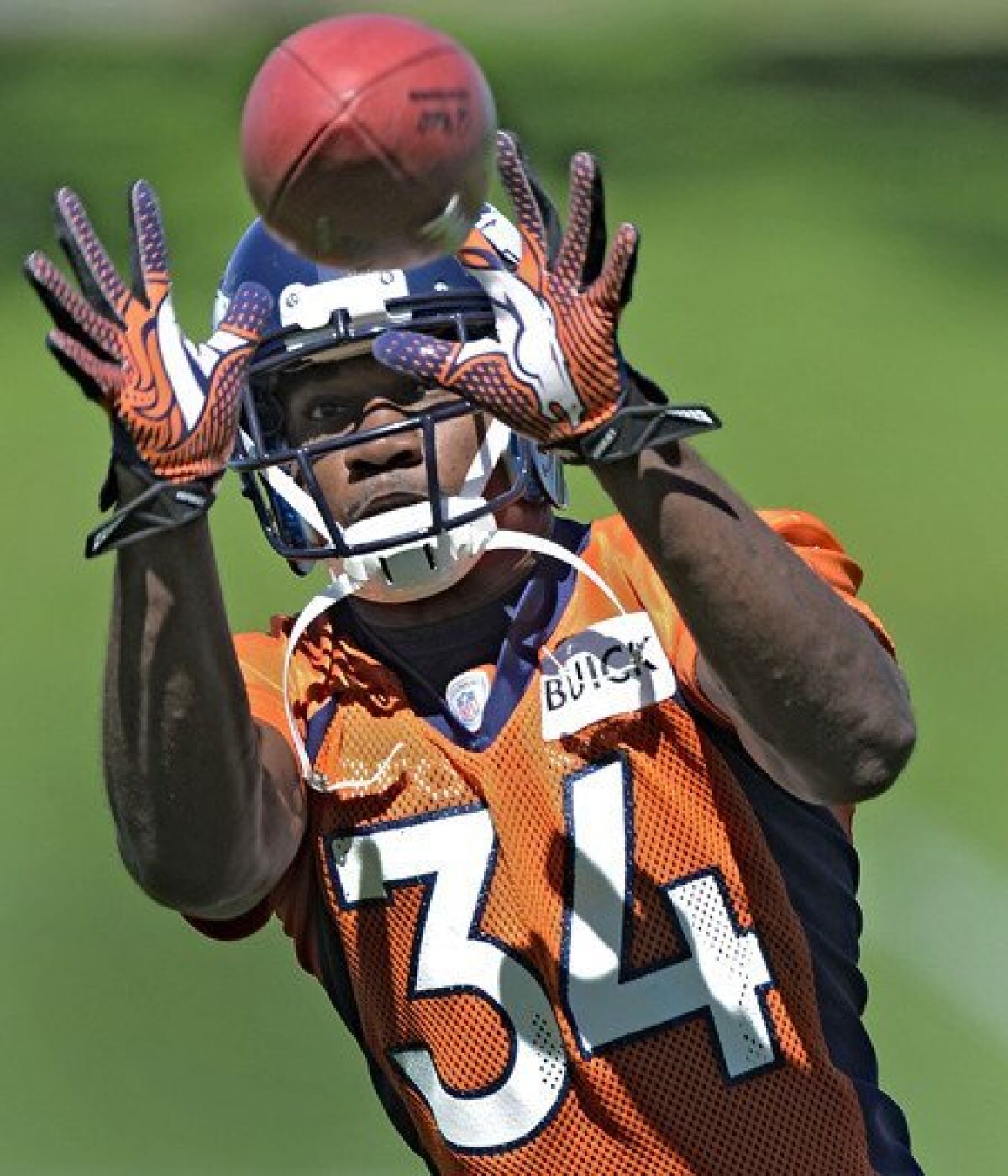 Broncos defensive back Quentin Jammer participates in a drill during practice Thursday.