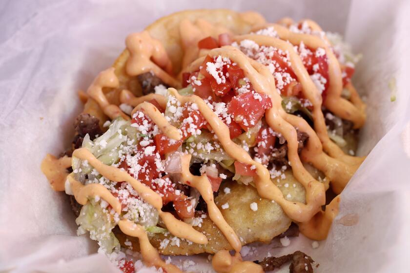 A puffy taco made with carne asada by Papi's Puffy Tacos at the Orange County Fair.