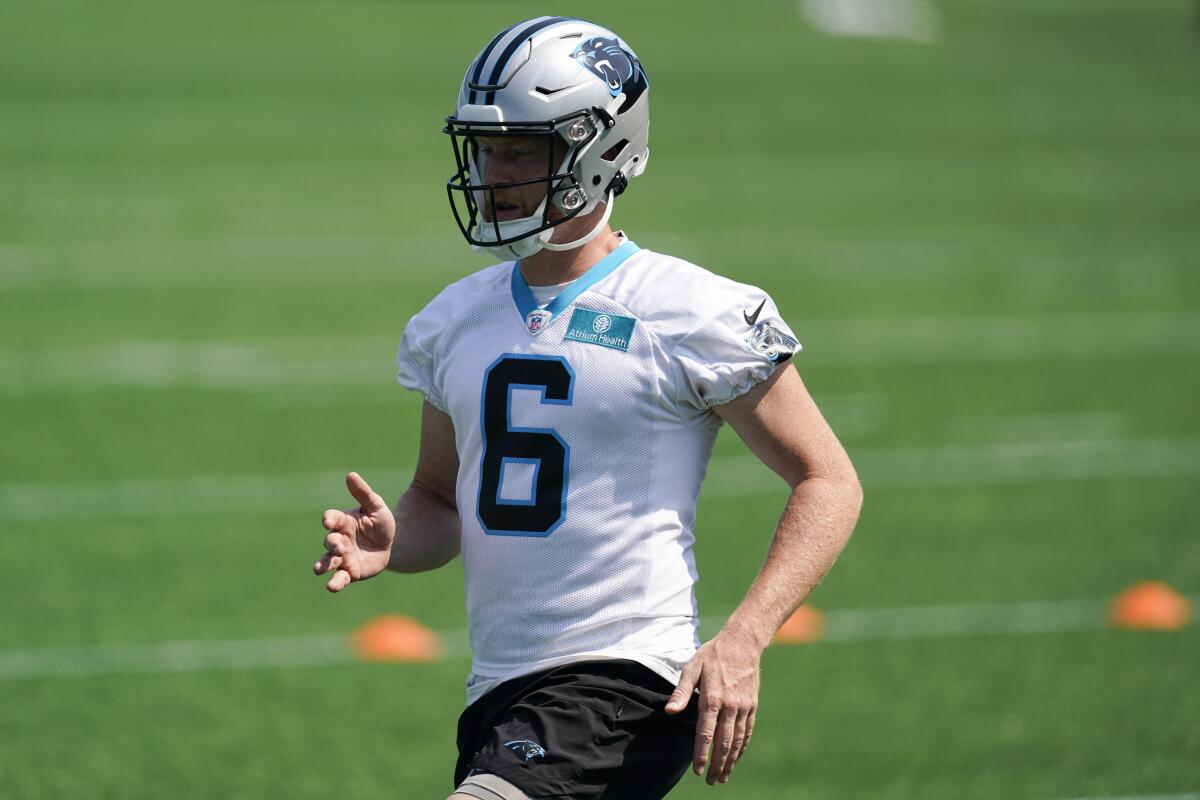 Carolina Panthers punter Johnny Hekker warms up during a minicamp practice in June.