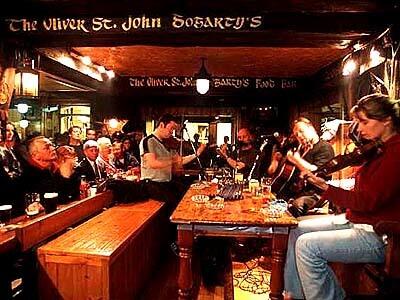 Old-fashioned, down-home atmosphere permeates Oliver St. John Gogarty's in Temple Bar, Dublin's trendy night life area, where serious fans as well as masters of traditional Irish music gather to hear tunes.