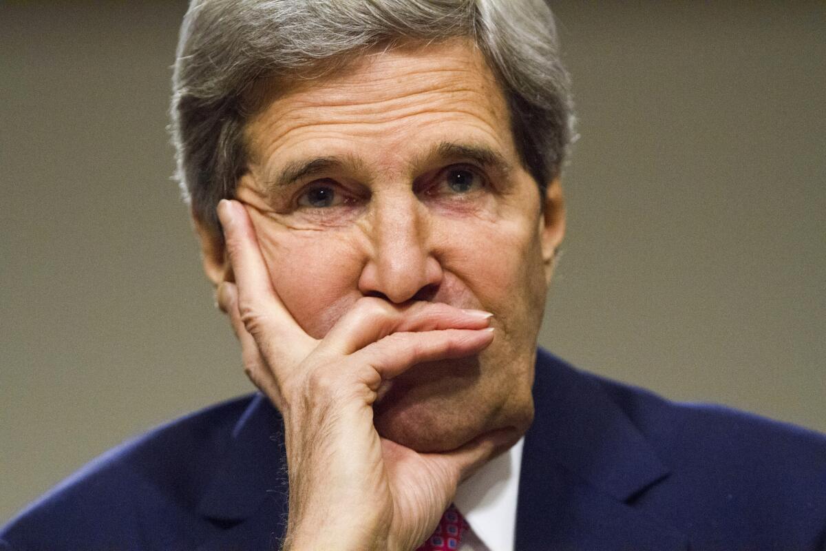 Secretary of State John F. Kerry, shown attending a Senate hearing in Washington on Thursday, was to travel Friday to Geneva to join talks there on Iran's nuclear program -- a sign that a preliminary deal was near.