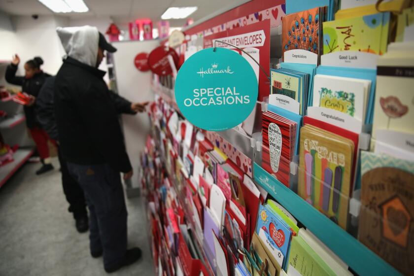 Customers choose cards and gifts on Valentine's Day.