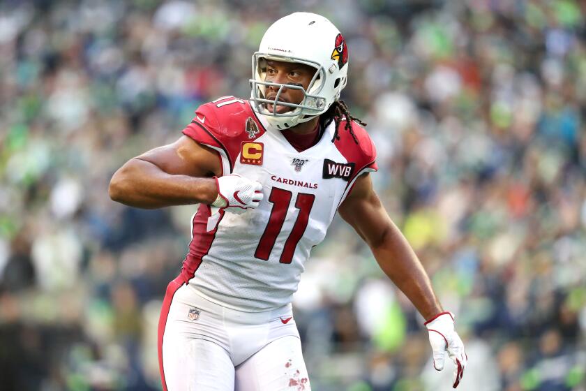 SEATTLE, WASHINGTON - DECEMBER 22: Wide receiver Larry Fitzgerald #11 of the Arizona Cardinals lines up for play during the game against the Seattle Seahawks at CenturyLink Field on December 22, 2019 in Seattle, Washington. (Photo by Abbie Parr/Getty Images)