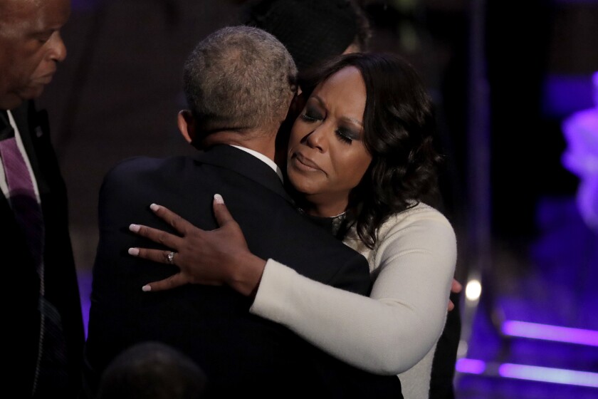 Maya Rockeymoore Cummings is greeted by former President Obama.