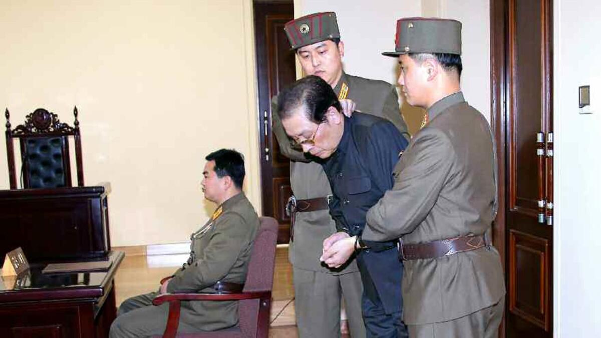 A photo released in 2013 by North Korean state media shows Jang Song Taek, uncle of North Korean leader Kim Jong Un, being brought into a courtroom. He was later executed.