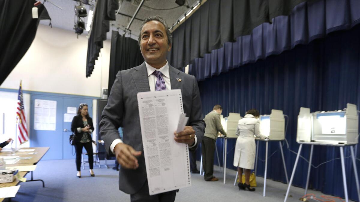 U.S. Rep. Ami Bera votes in his home district in Elk Grove on election day 2014.