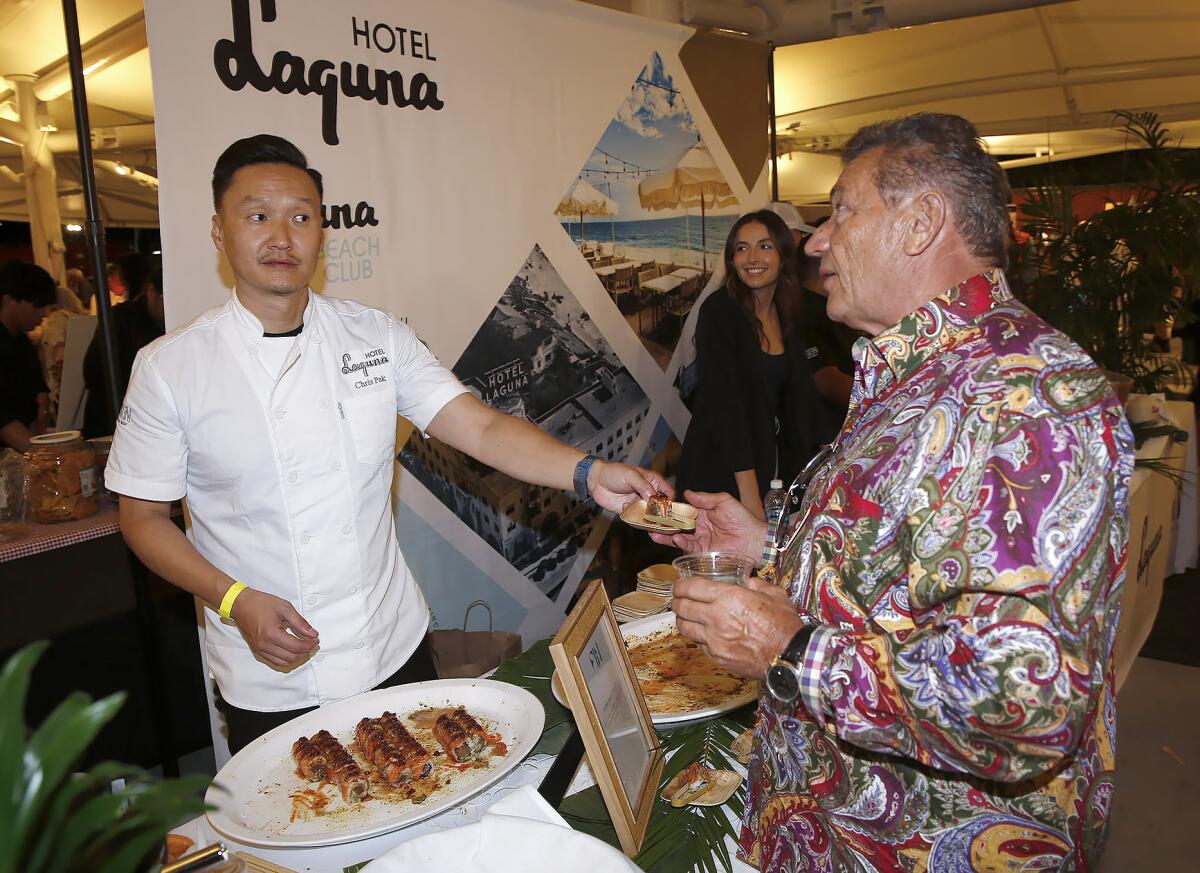 Chef Chris Pan from Hotel Laguna offers a special sushi roll at the Taste of Laguna.