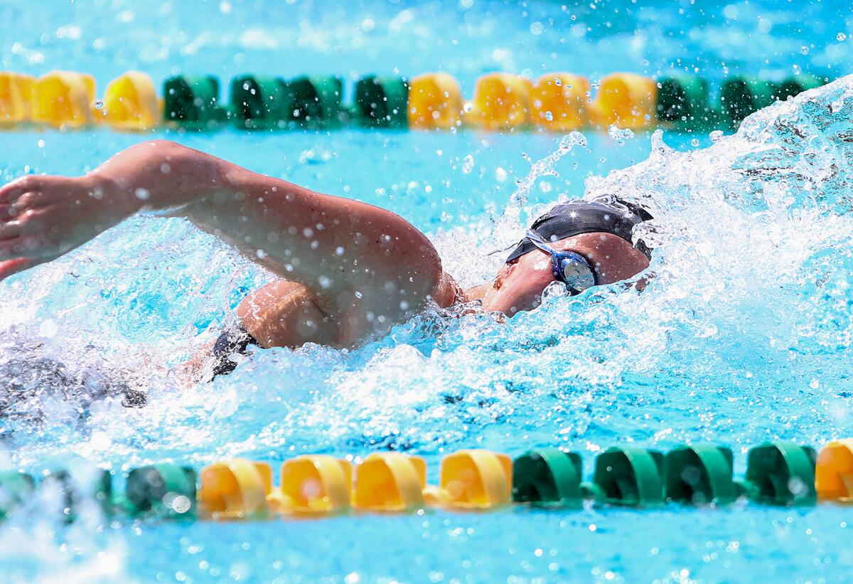 Ava Knepper of Laguna Beach swims the girls' varsity 50 yard sprint to victory during the Wave League swim finals.