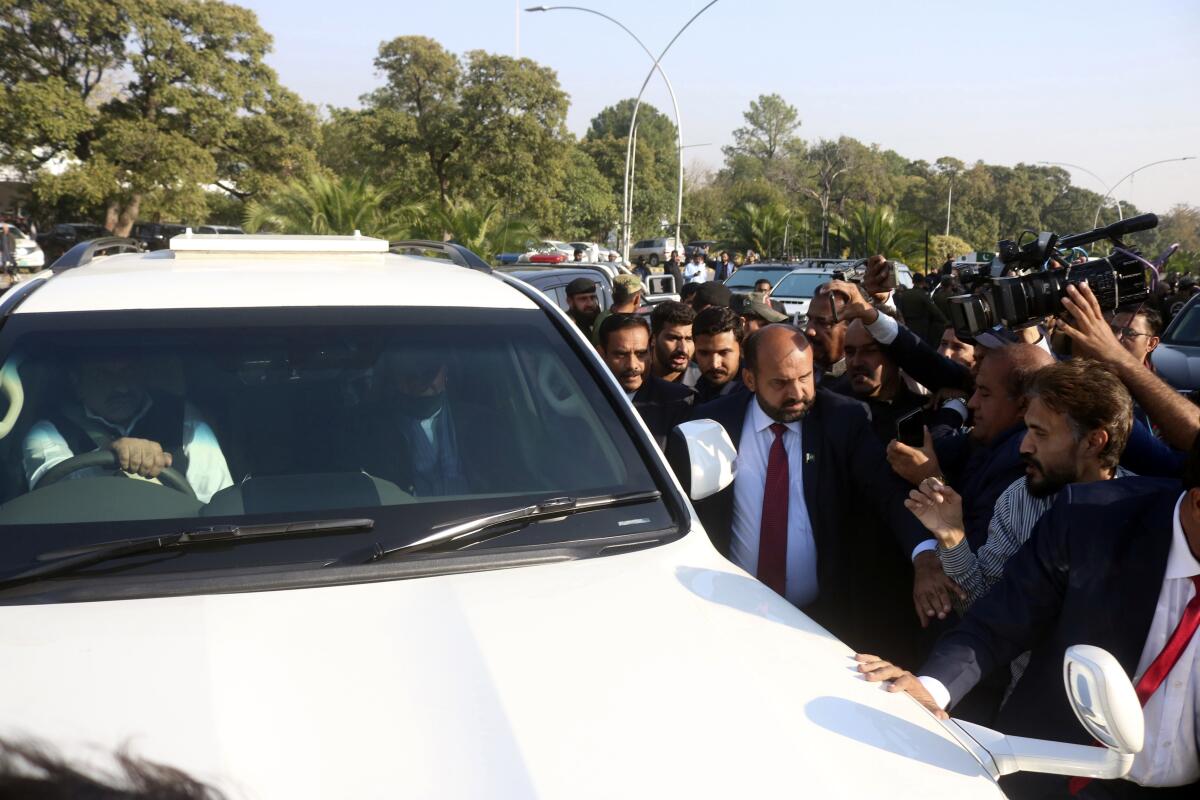 A vehicle carrying Pakistan's former Prime Minister Nawaz Sharif arrives at court.