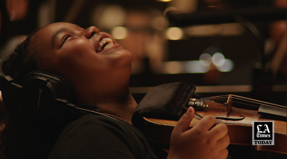 An LAUSD student plays her instrument in a still taken from the short documentary "The Last Repair Shop."