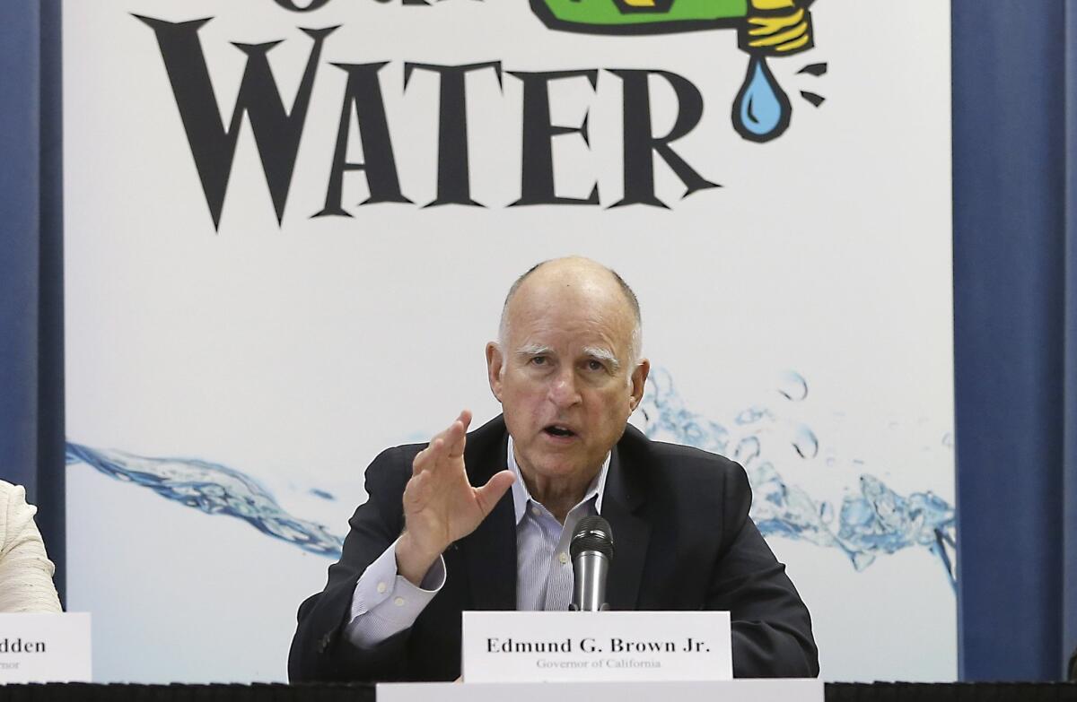 Gov. Jerry Brown speaks about the drought in an April meeting. He issued an executive order on Friday that could extend conservation rules in urban areas until next fall.