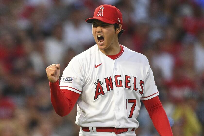 ANAHEIM, CA - APRIL 21: Los Angeles Angels Pitcher Shohei Ohtani (17) celebrates a double play.