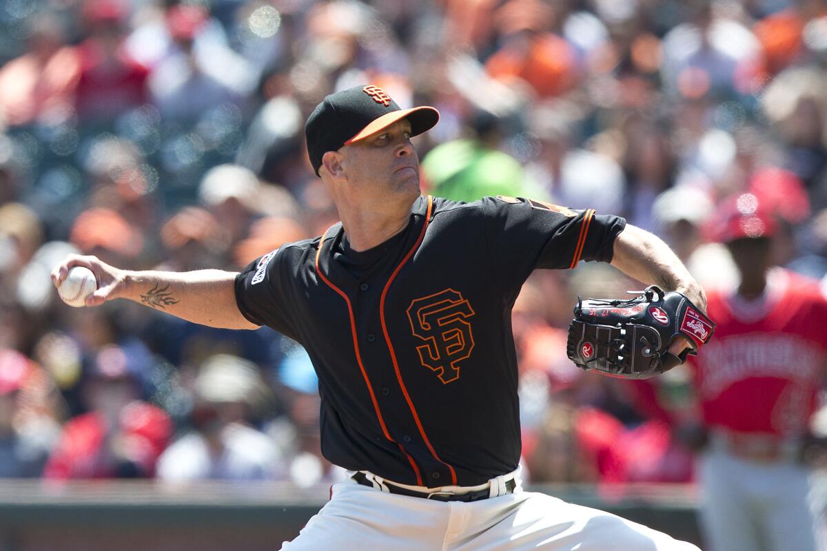 Giants pitcher Tim Hudson retired the first 10 batters he faced and gave up three runs, two hits and two walks in eight-plus innings against the Angels on Saturday.