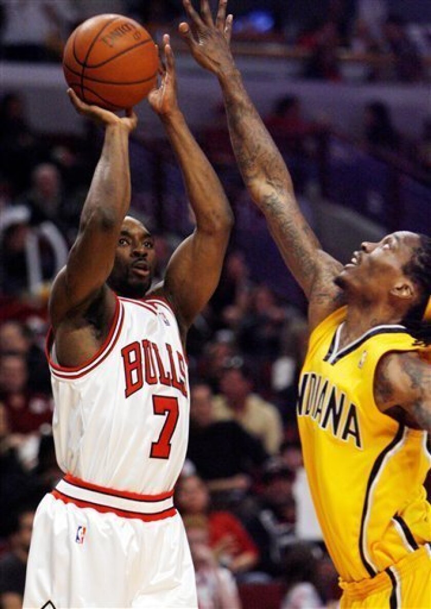 Chicago Bulls' Ben Gorden, left, shoots over Indiana Pacers' Marquis Daniels during the third quarter of an NBA basketball game Saturday, Nov. 15, 2008 in Chicago. (AP Photo/Nam Y. Huh)