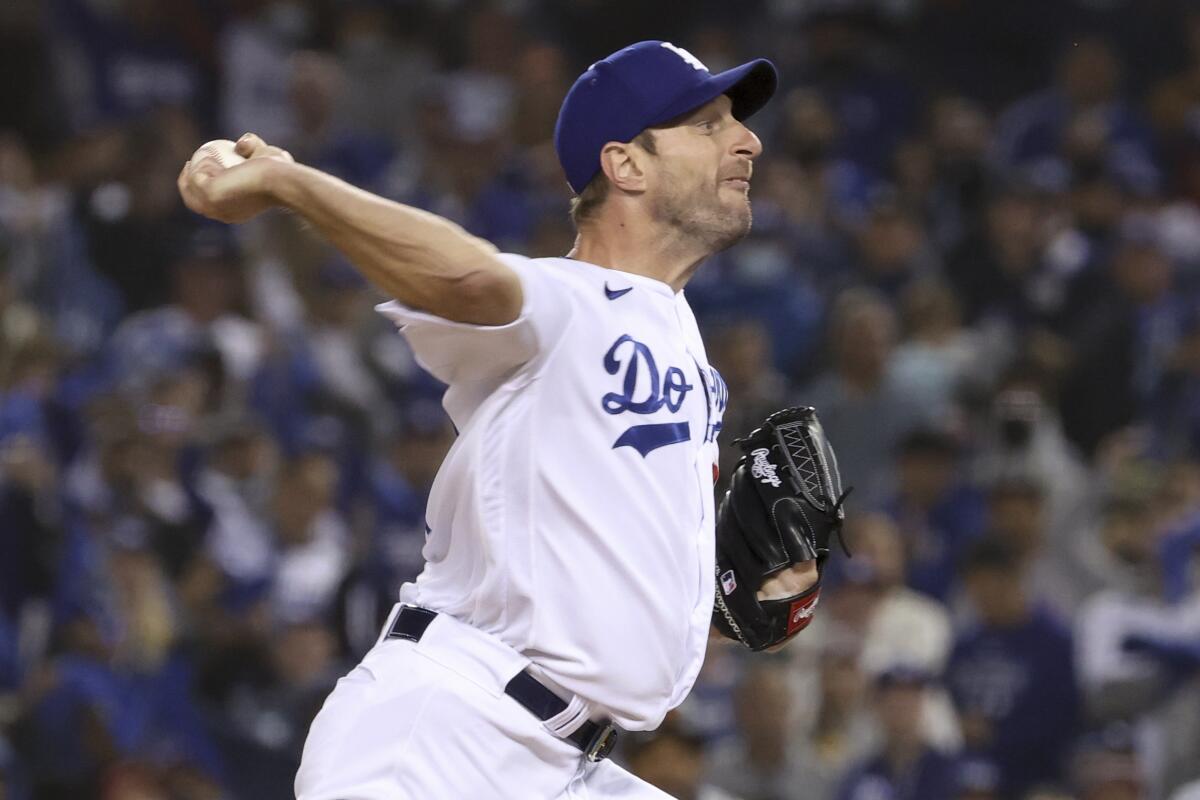 Dodgers starting pitcher Max Scherzer delivers during the first inning of Game 3 of the NLDS.