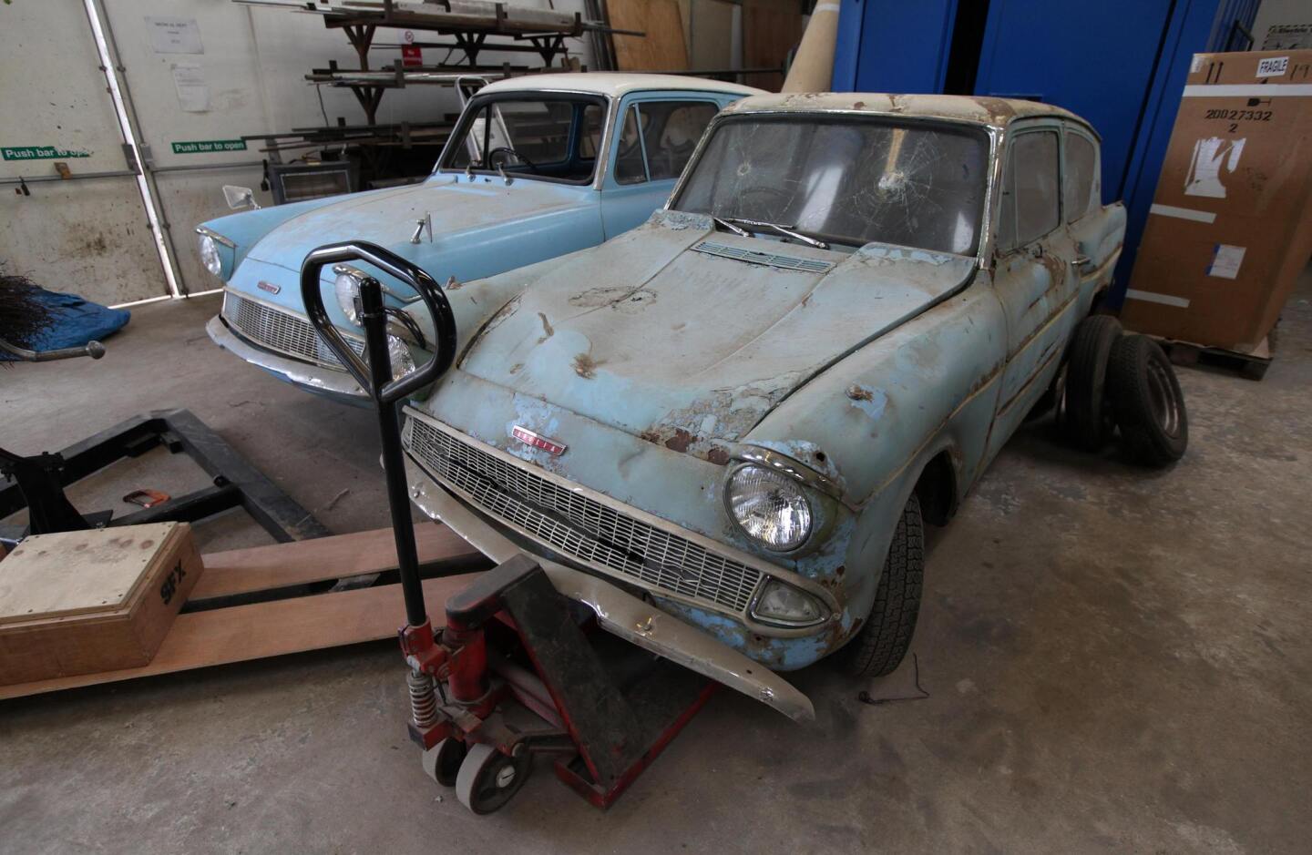 These Ford Anglia's have definitely seen better days.