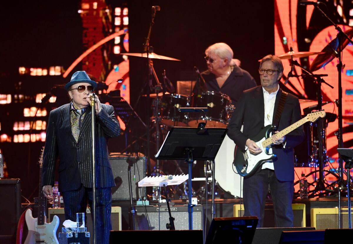 Van Morrison, left, and Eric Clapton on stage at the O2 Arena 